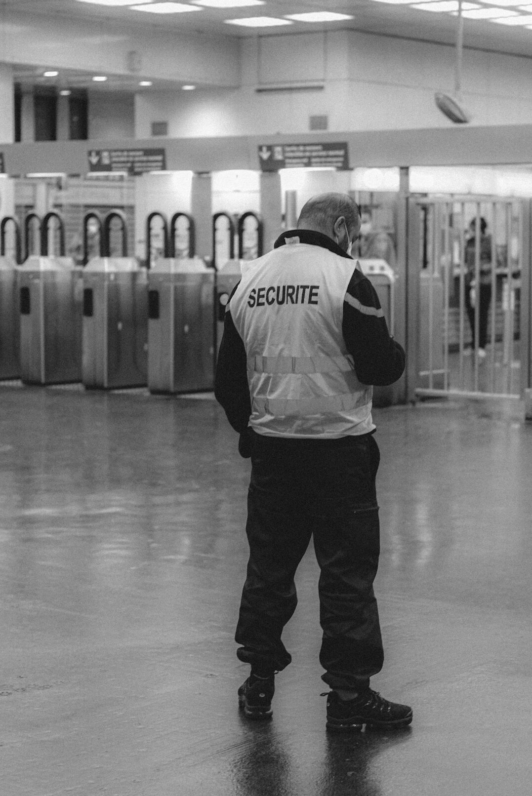 store detective watching aisle