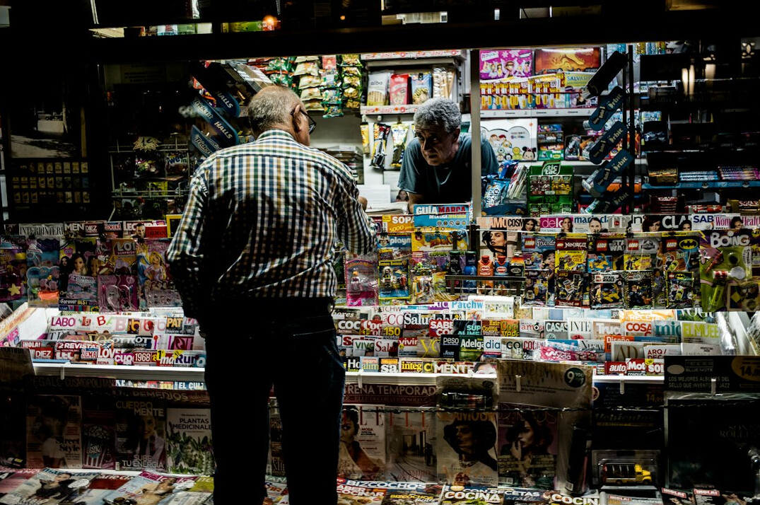 store detective observing shopper