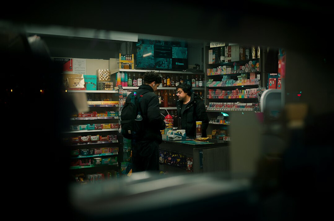 store detective observing suspect